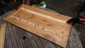 reclaimed wood with dowels sticking out and glue in patches
